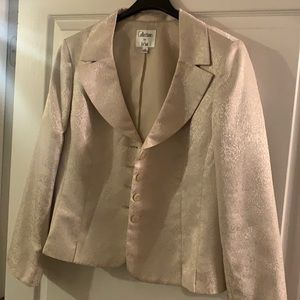 Gently worn shimmery gold four button skirt suit